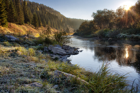 Autumn landscape on the mountain river with rimeの写真素材
