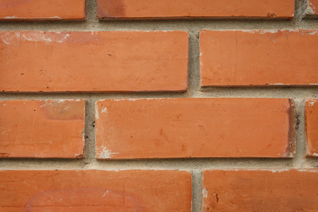 Brown brick wall background.