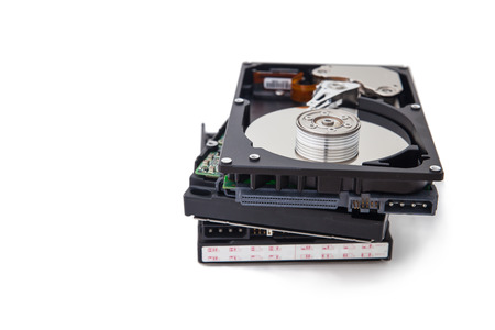 Hard Disk drives stacked isolate on white background.