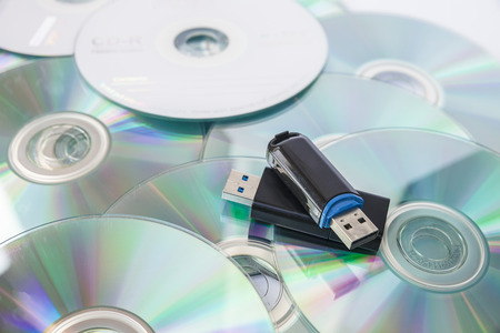 Usb flash drives on stacked CDsの写真素材