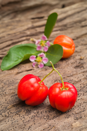 Cherry fruit on the wooden background.の写真素材