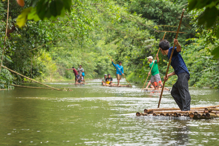 Phang nga, Thailand - Sept 12,2015 : Unidentified man who rafting on the brook Phang nga, Thailand. The bamboo raft for tourist activity.のeditorial素材