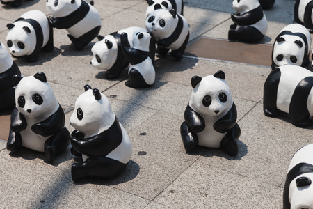 Bangkok, Thailand - March 8, 2016 : 1600 Pandas+ TH, Flash mob of paper mache Pandas on March 8, 2016. This campain of WWF to represent 1,600 Pandas still remaining  and to raise awareness in conservation for endangered animals in Thailand.のeditorial素材