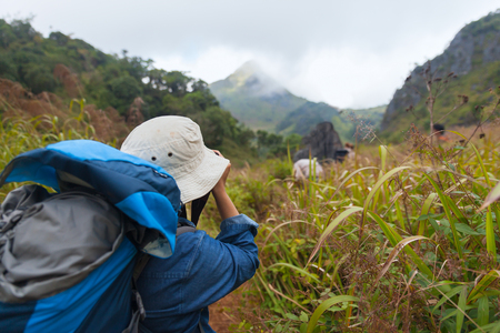 CHIANG MAI, THAILAND - DEC 8, 2015 : Traveller Taking the picture on the mountain on Doi Luang Chiang Dao Mountain on December 8, 2015 in Chiang mai, Thailand.の写真素材