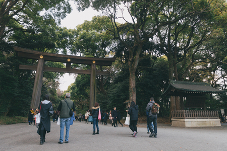 TOKYO, JAPAN - MAR 27,2016 : Meiji-jingu park gate in Harajuku, Tokyo, Japan on 27 March 2016.のeditorial素材