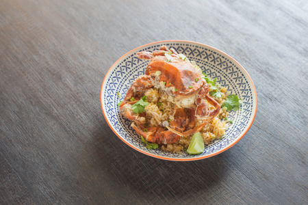 Fried rice with crab on wooden table.の写真素材