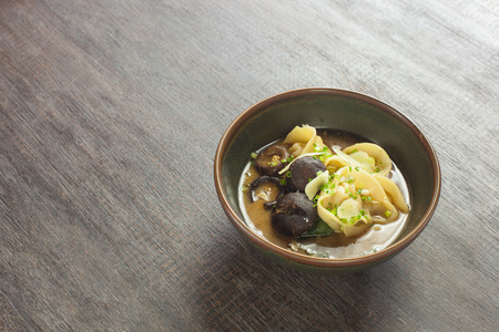 Dumpling soup with shiitakの写真素材