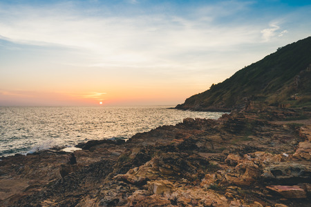 Seascape with rock in beautiful sunset in Khao Laem Ya, Thailand.の写真素材