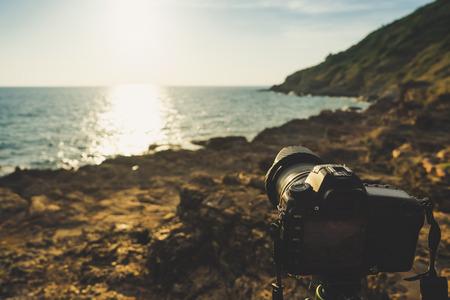DSLR camera capturing sunset of seascape Khao laem ya, Thailand.の写真素材