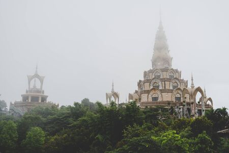PHETCHABUN, THAILAND - Aug 5 : Wat Phra Thart Pha Son Kaew in misty weather on August 5, 2017. This...