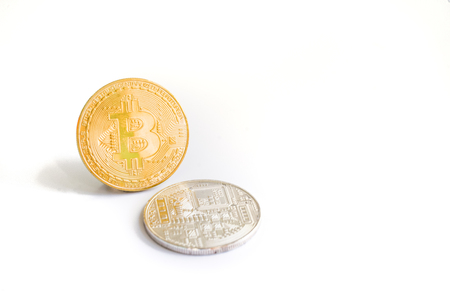 Golden and silver bitcoin isolated on white background.の写真素材