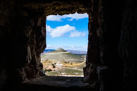 window in old medieval castle in guadalajara spainの写真素材