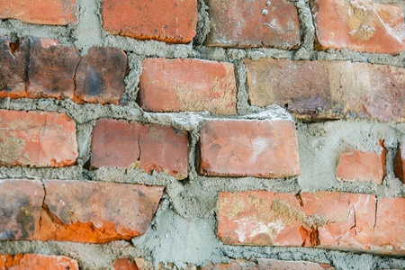 Old red brick wall in the street backgroundの写真素材