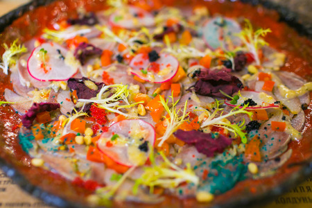 Vegetables and herring appetizer served with caviar close-upの写真素材