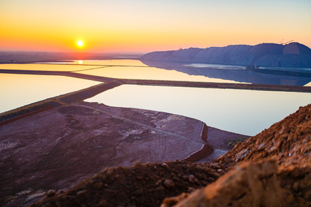 Potassium wasteland. Slam separators near potash piles landscapeの写真素材