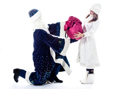 Santa Claus with her granddaughter prepare to greet the new yearの写真素材