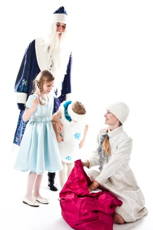 Santa Claus, a granddaughter and a beautiful little girlの写真素材