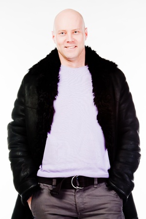 A young and successful business man in a dark business suitの写真素材