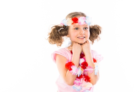 Small and beautiful girl in Hawaiian dressの写真素材