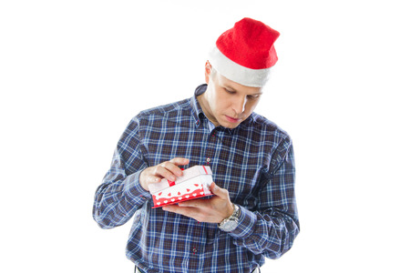 young and handsome man with a giftの写真素材