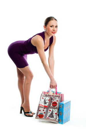 young attractive woman with shopping bagsの写真素材