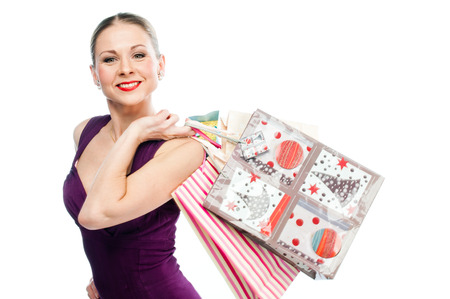 young attractive woman with shopping bagsの写真素材