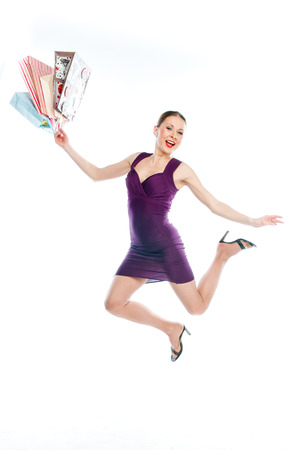 young attractive woman with shopping bagsの写真素材