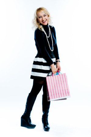 young attractive woman with shopping bagsの写真素材