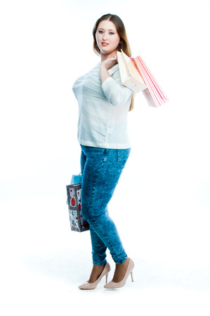 young attractive woman with shopping bagsの写真素材