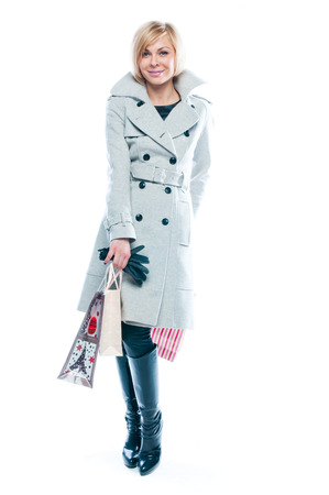young attractive woman with shopping bagsの写真素材