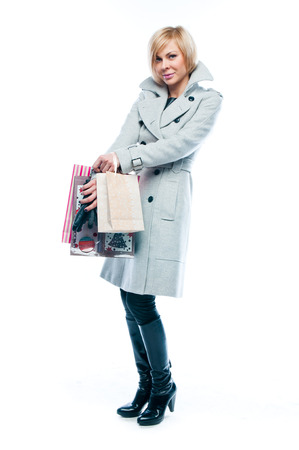 young attractive woman with shopping bagsの写真素材