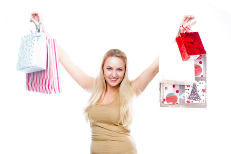 young attractive woman with shopping bagsの写真素材