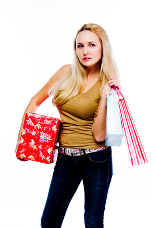 young attractive woman with shopping bagsの写真素材