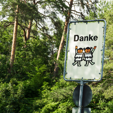 Thank carefully road sign children in Germanの写真素材