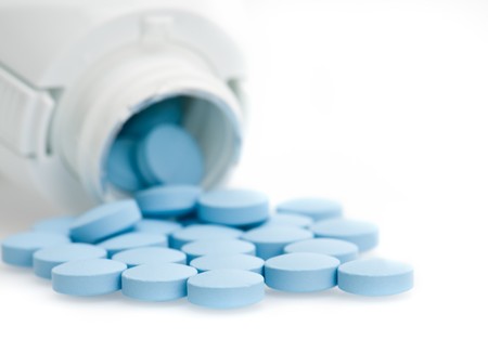 Spill of analgesic pills close up. Macro shot, use of selective focus.の写真素材