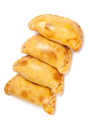 Group of Latin american empanadas. The Empanada is a pastry turnover filled with a variety of savory ingredients and baked or fried.の写真素材