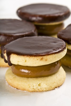 Close up of cornflour cookies filled with caramel and covered with Chocolate.の写真素材