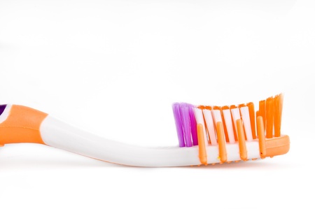 Close up of a toothbrush over white background.
