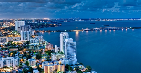 Aerial view of Biscayne Bay and Miami Beach at night.の写真素材