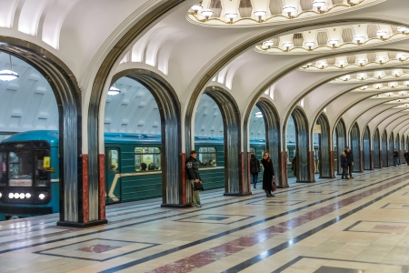 MOSCOW - CIRCA MARCH 2013: People waiting in the famous Mayakovskaya Metro Station circa march 2013. With a population of more than 11 million people is one the largest cities in the world and a popular tourist destination.のeditorial素材