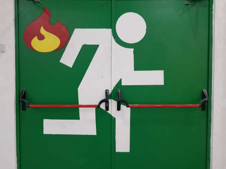 Image of a running man at a fire escape