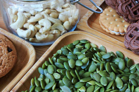 Cashew nuts and pumpkin seeds for breakfastの写真素材