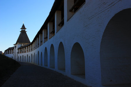 White stone walls and towers of an ancient fortress