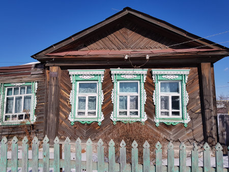 Wooden windows in an old peasant houseのeditorial素材