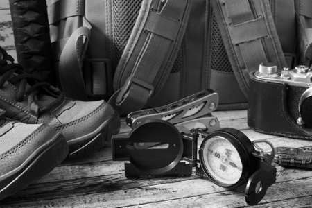 Compass, multitool and a backpack for a hikeの写真素材