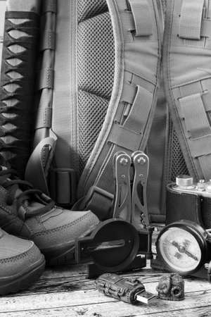 Compass, multitool and backpack for hikingの写真素材