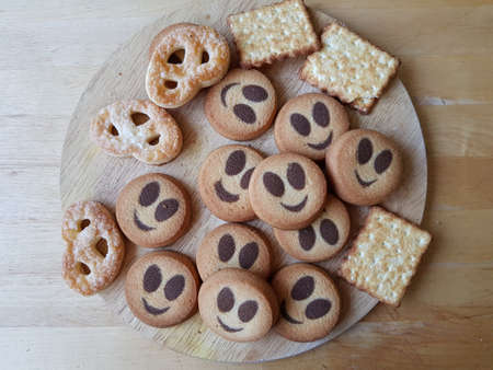 Cookies in the form of funny emoticons for breakfast