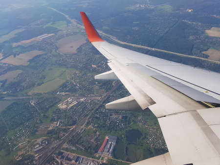The plane flies among the clouds