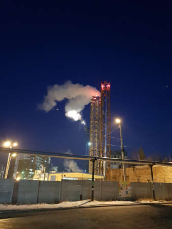 Smoke comes from the chimneys of the factory