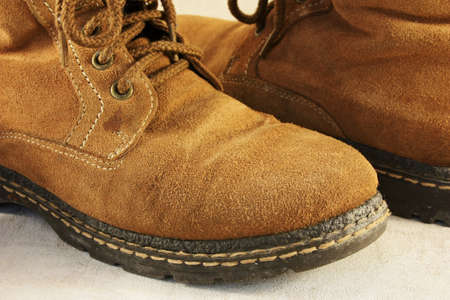 Old leather brown trekking boots